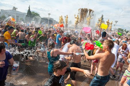 25385467-moscow-july-14-young-people-shooting-and-throwing-water-at-each-other-during-flash-mob-water-battle-stock-photo